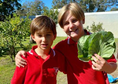 Illuka Public School Students with homegrown cabbages