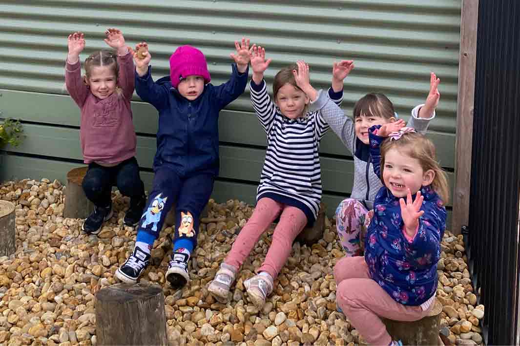 Children at the Gippsland Lakes Complete Health Children's Centre enjoying their new biodiversity focused outdoor education space